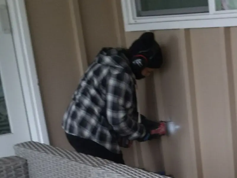 Professional electrician installing an exterior outlet in Cashmere