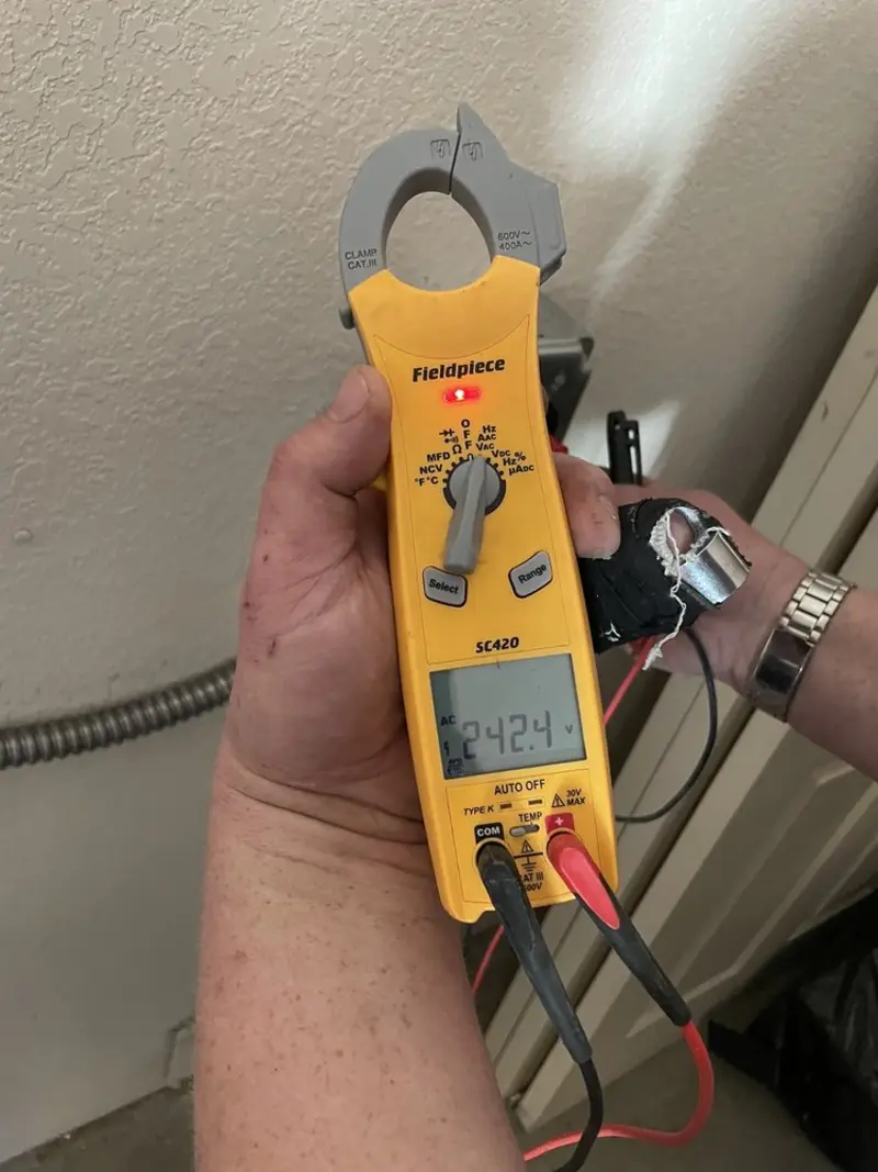 Voltage testing with clamp meter during Hot Tub / Pool Electrical Wiring in Cashmere